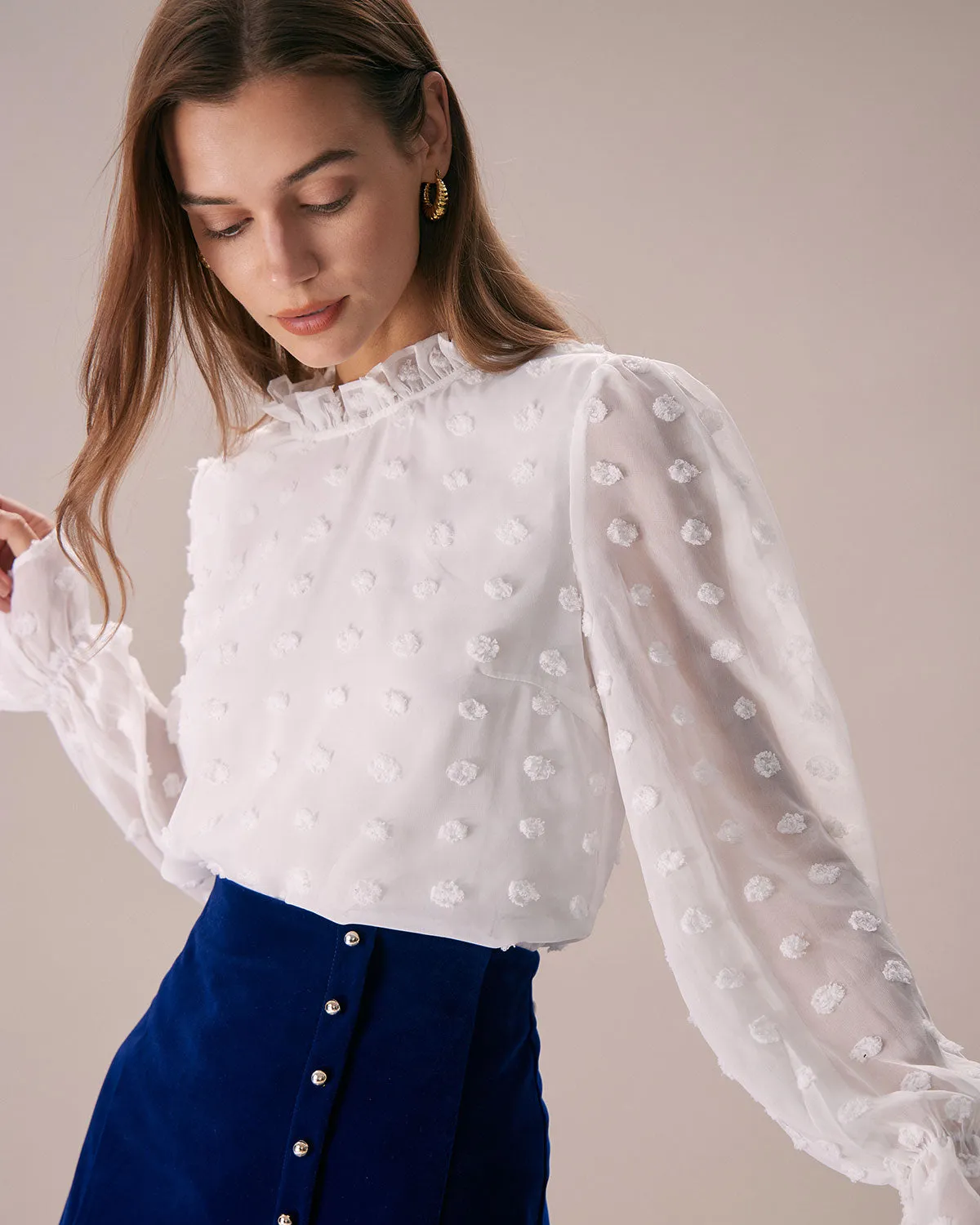 The White Mock Neck Dobby Sheer Blouse