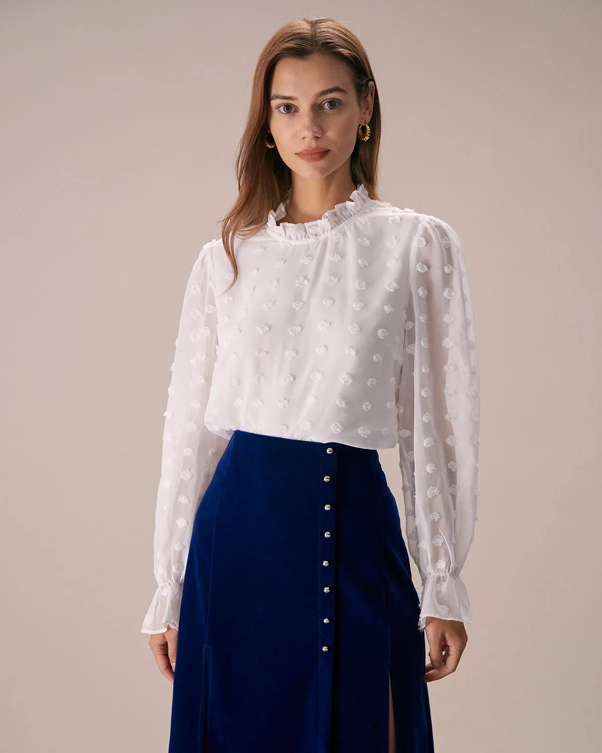 The White Mock Neck Dobby Sheer Blouse