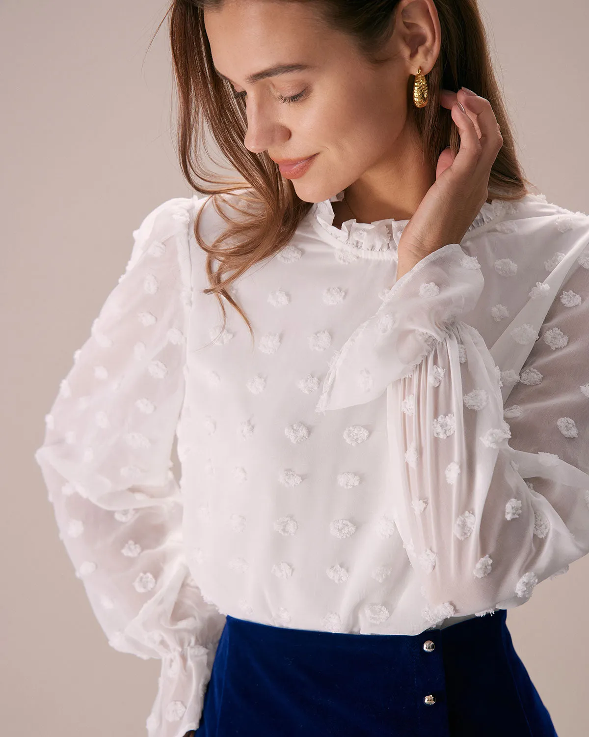 The White Mock Neck Dobby Sheer Blouse