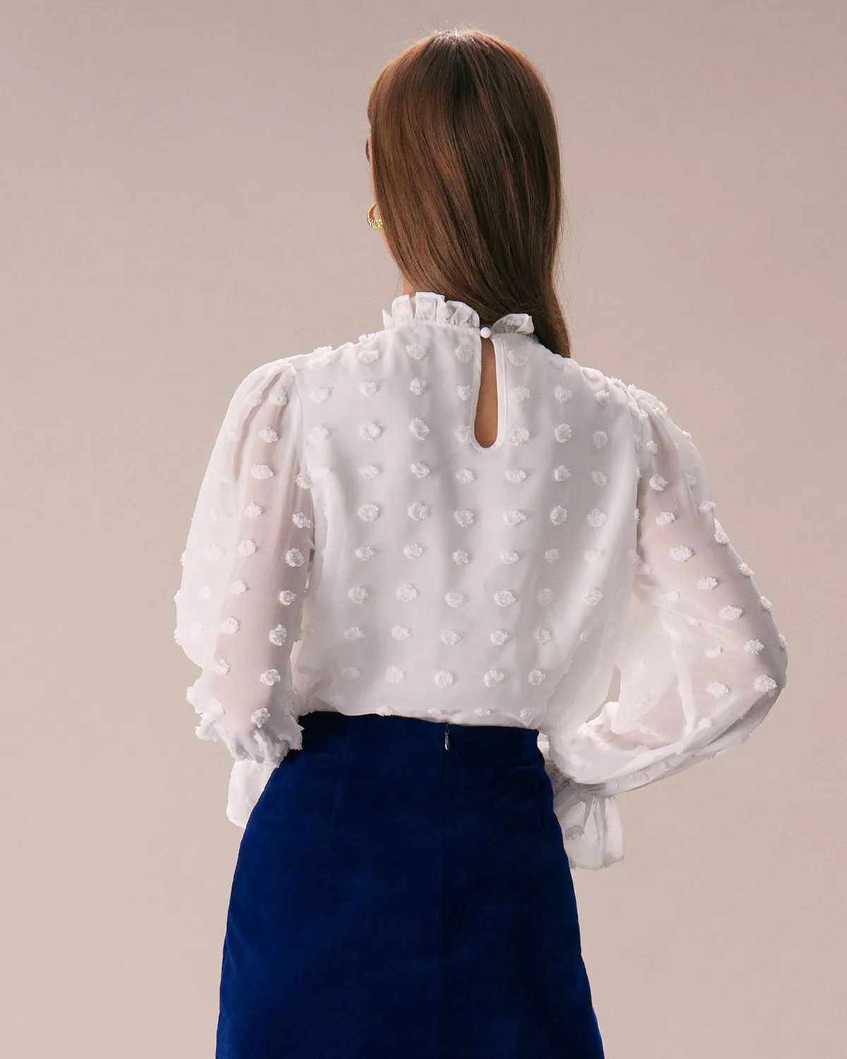 The White Mock Neck Dobby Sheer Blouse